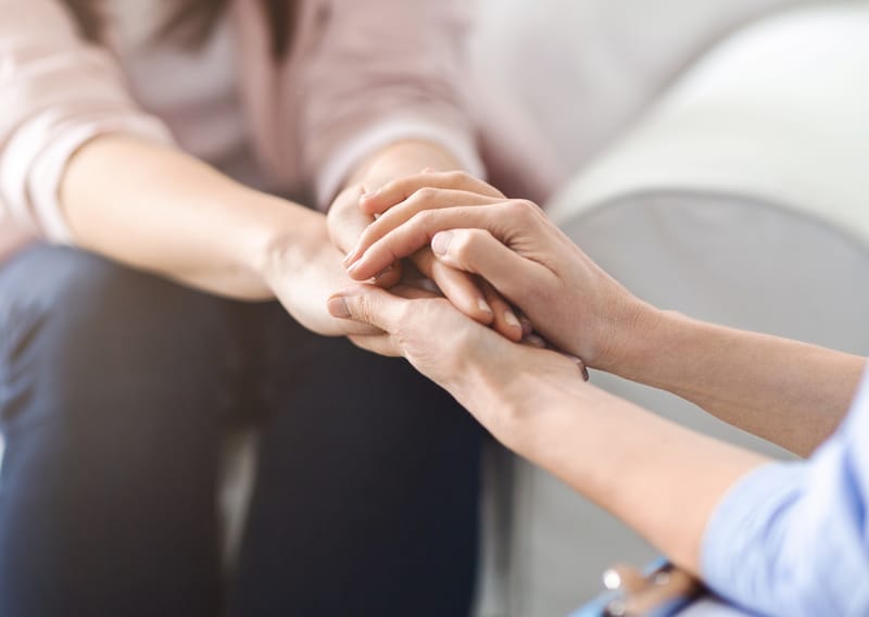 Hands holding